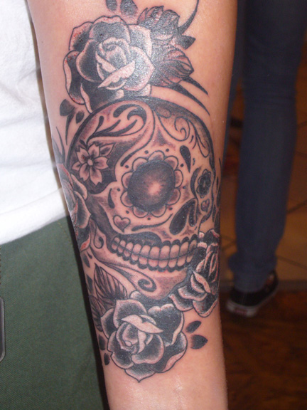 Sugar skull with roses tattoo by Jennifer Overbury